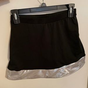 Varsity black skort with silver trim.
